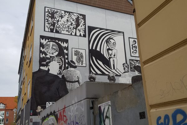 Das Foto zeigt Streetart an einer Hauswand in Dortmund