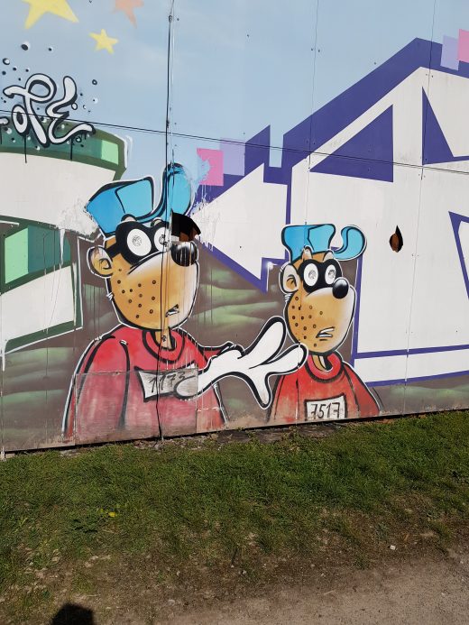 Das Foto zeigt eine Graffitti Wand mit den Panzerknackern in Essen