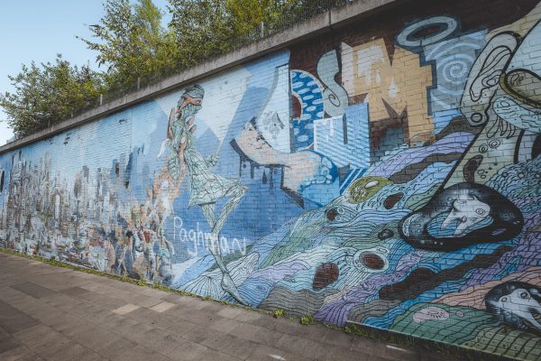 Das Foto zeigt ein Mural bei einem Graffitti Walk durch Essen