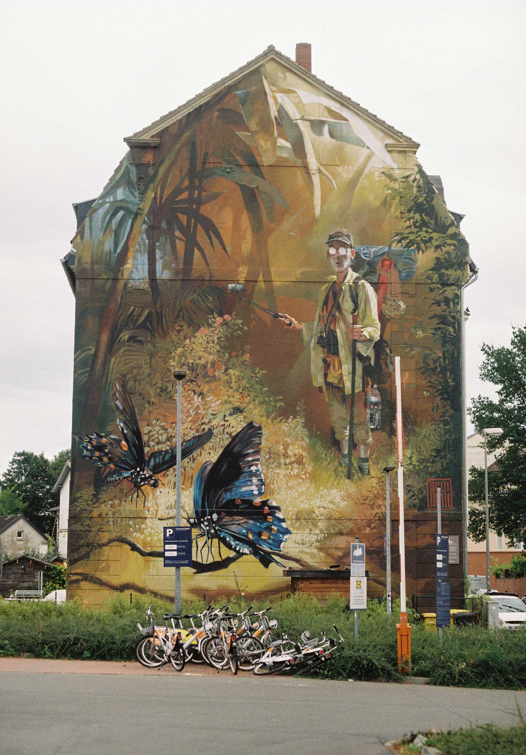 Das Foto zeigt ein großes Graffiti auf einer Häuserwand in Gelsenkirchen Ückendorf.